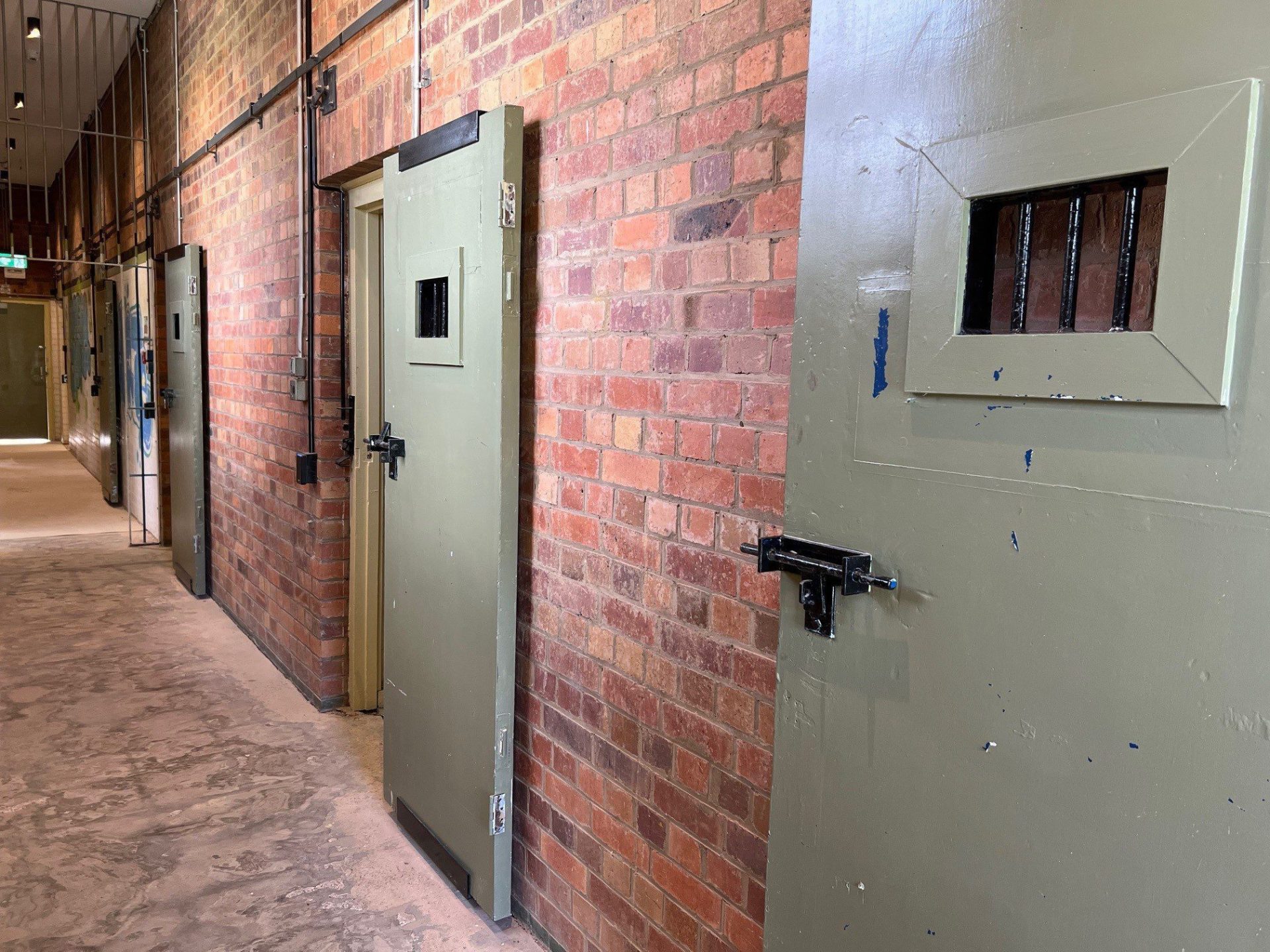 A corridor of one of the cell blocks of Witton Barracks, a restored WW2 site.