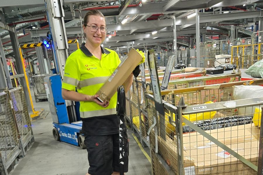 Alona Adunbi holding a parcel